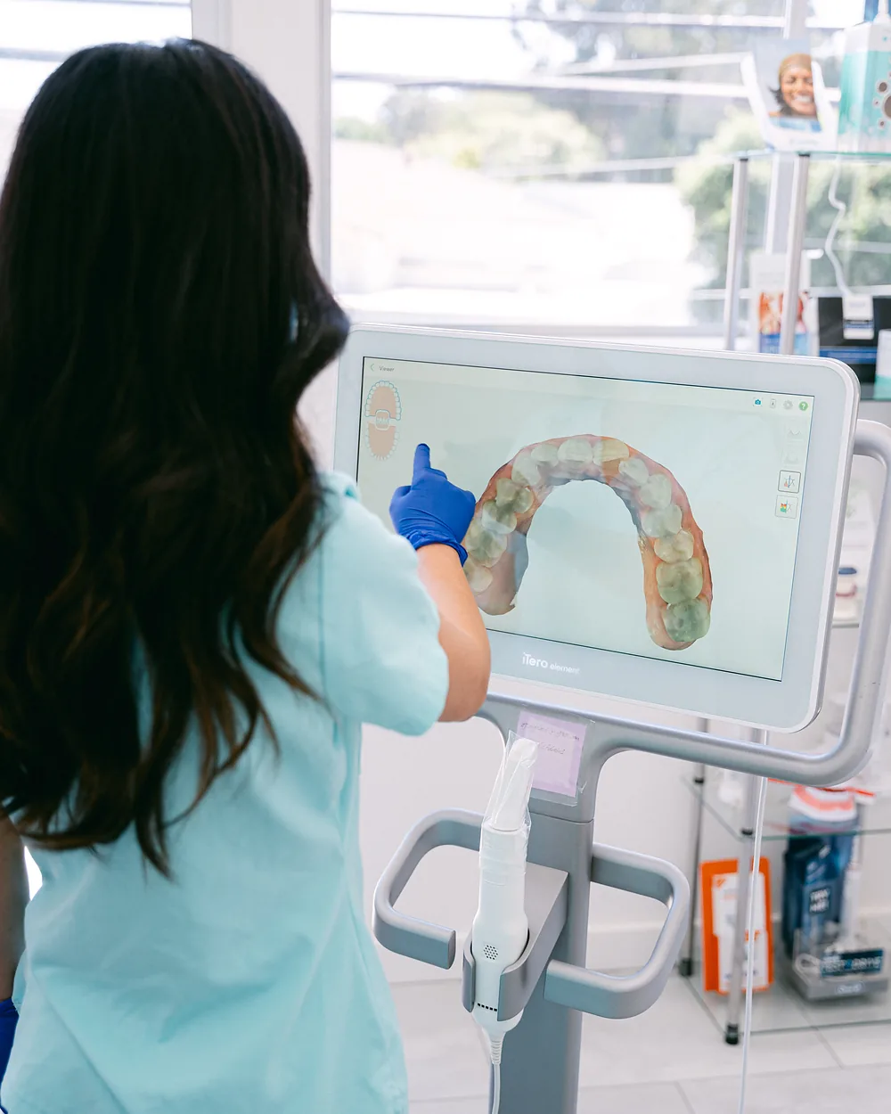 Dentist reviewing a digital intraoral scan on screen